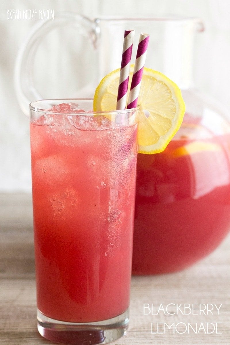 A glass of Blackberry Lemonade on a table