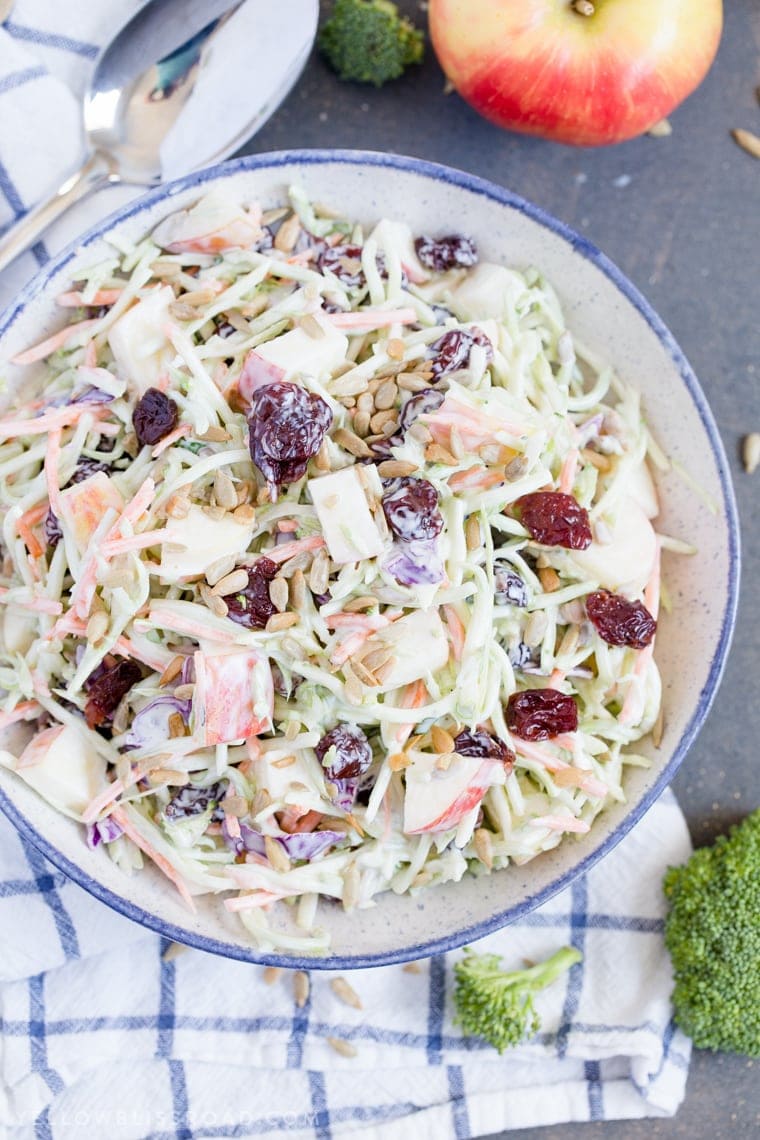 Broccoli Slaw with Apples & Dried Cherries is creamy, crunchy and sweet, making it the best side dish for summertime barbecues to Thanksgiving dinner. 