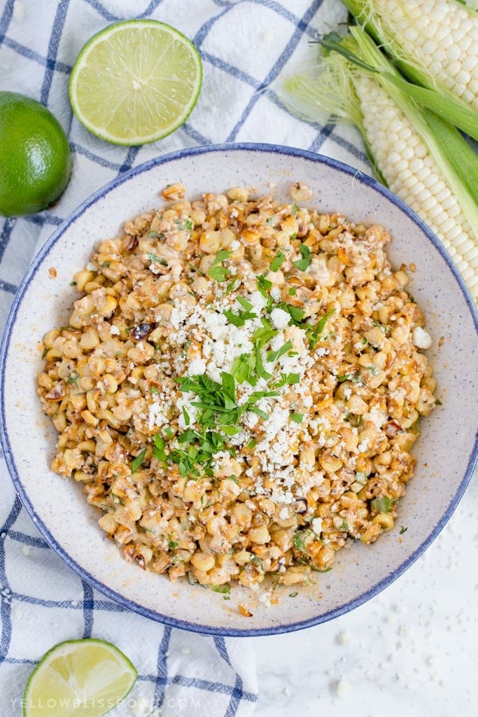Mexican Street Corn Salad is super creamy with tons of flavor - it's everything you love about the street corner classic in a delicious summer side dish.