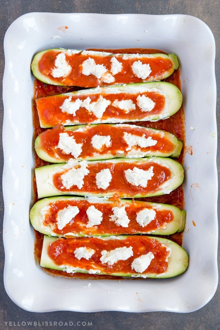 Goat Cheese & Marinara Stuffed Zucchini Boats with marinara and goat cheese