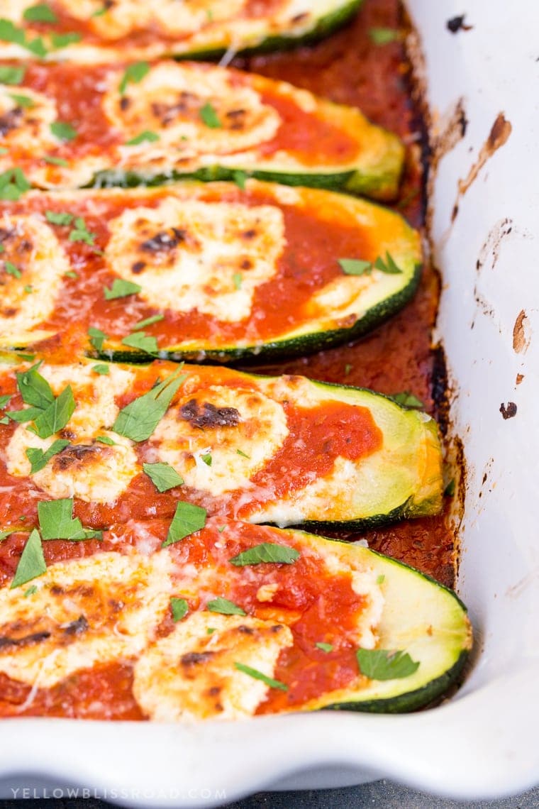 Goat Cheese & Marinara Stuffed Zucchini Boats with parsley