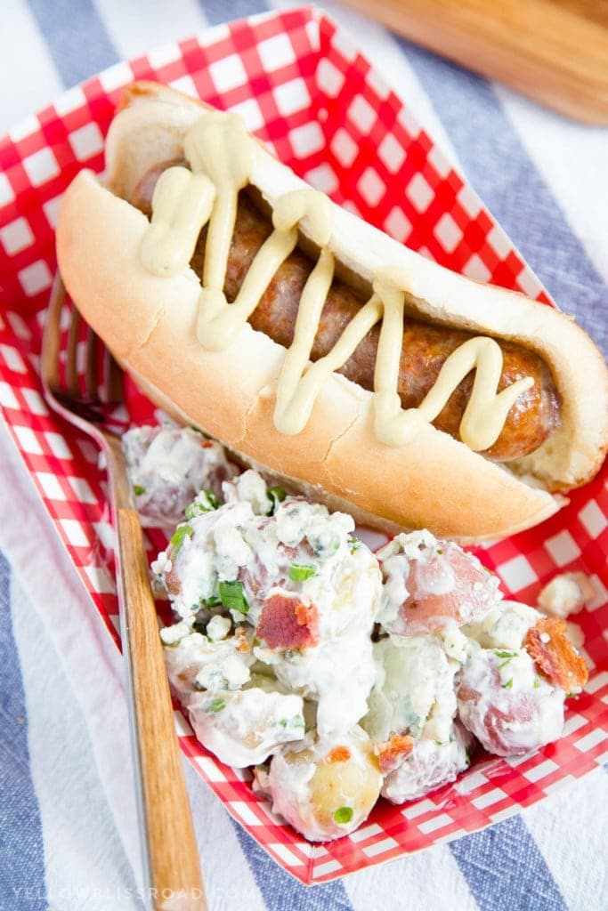 This Red, White and Blue Cheese Potato Salad is the perfect side dish to amp up your summer picnic or backyard barbecue and is delicious alongside some Johnsonville Grilled Sausage! (ad)e!