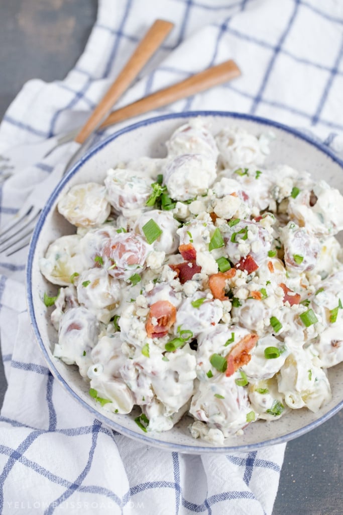 Red, White and Blue Cheese Potato Salad is creamy and savory and the perfect side dish for all of your summer picnics and barbecues!