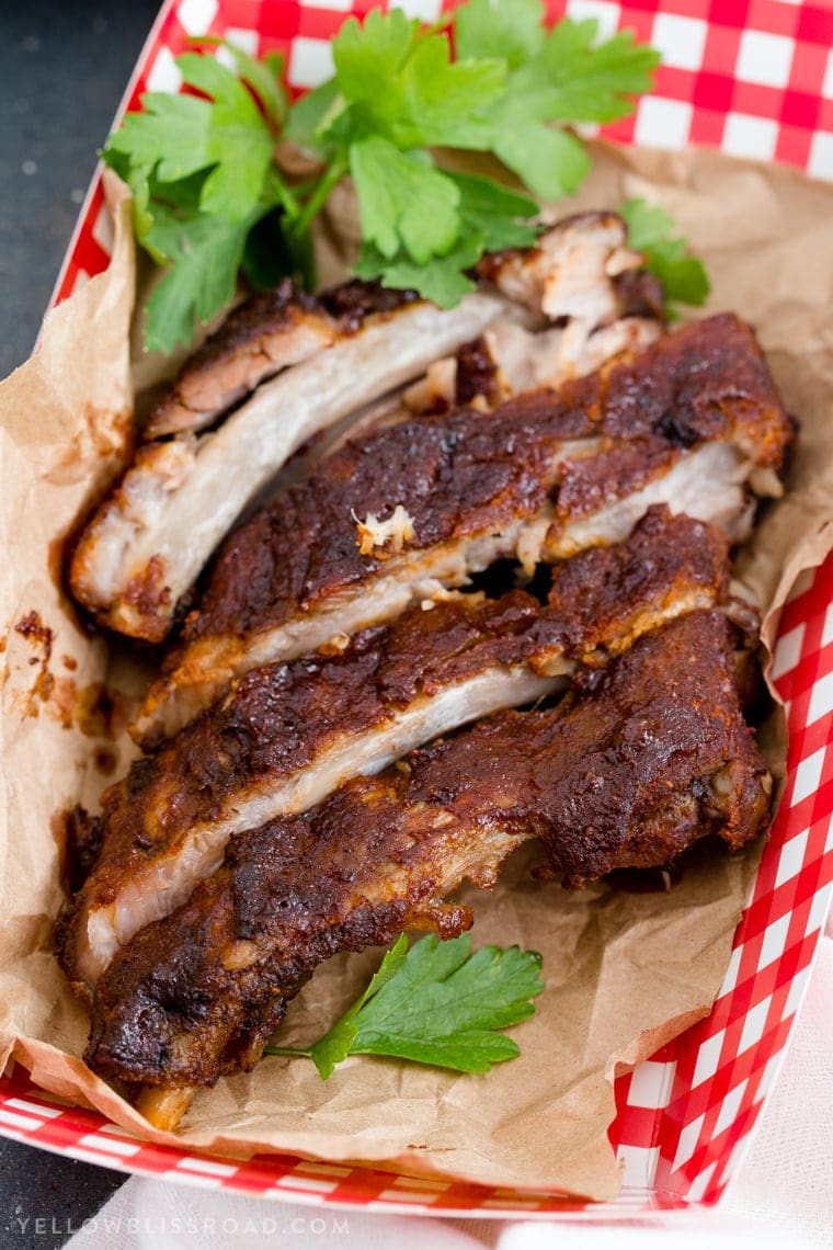 slow cooker ribs in a paper container