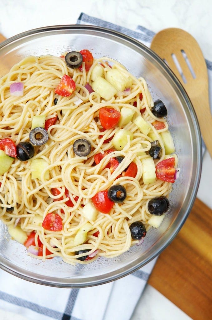 Summer Spaghetti Salad with vegetables and Italian Dressing is a simple twist on the classic pasta salad. Delicious summer side dish!
