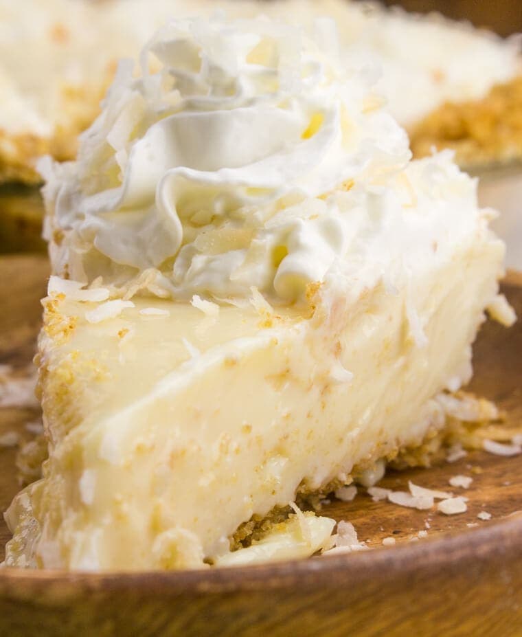 Tart, fruity and sweet this Coconut Key Lime Pie is one of the best and most loved dessert pies! This pie even had coconut IN the crust!