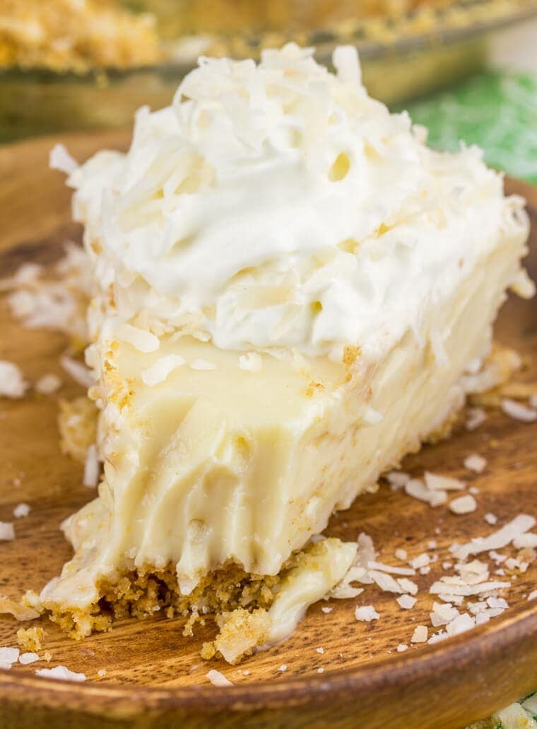 Tart, fruity and sweet this Coconut Key Lime Pie is one of the best and most loved dessert pies! This pie even had coconut IN the crust!