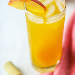 This Peach Sangria is the perfect thing to keep your whole family refreshed this summer!