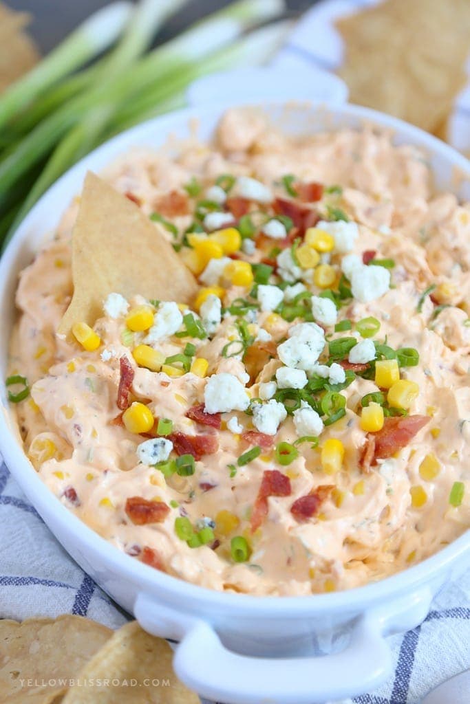 My Buffalo Bacon Ranch Corn Dip is a real crowd pleaser, with spicy buffalo wing sauce, sweet corn, tangy blue cheese and creamy ranch!