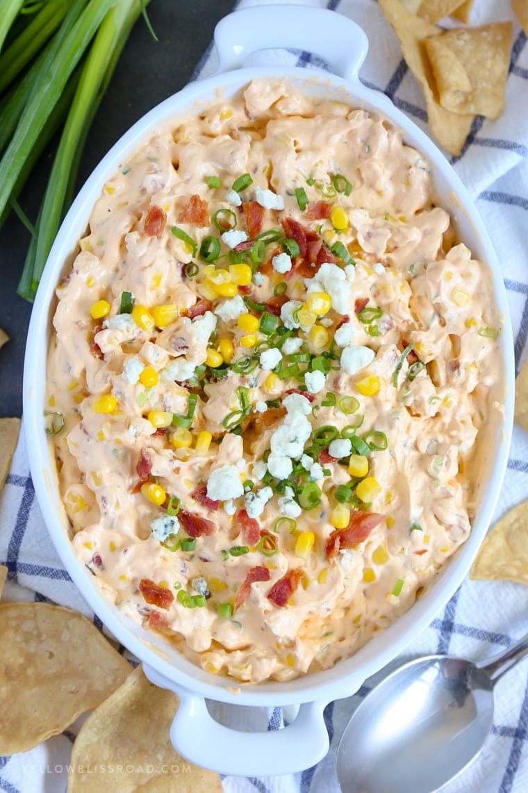 My Buffalo Bacon Ranch Corn Dip is a real crowd pleaser, with spicy buffalo wing sauce, sweet corn, tangy blue cheese and creamy ranch!