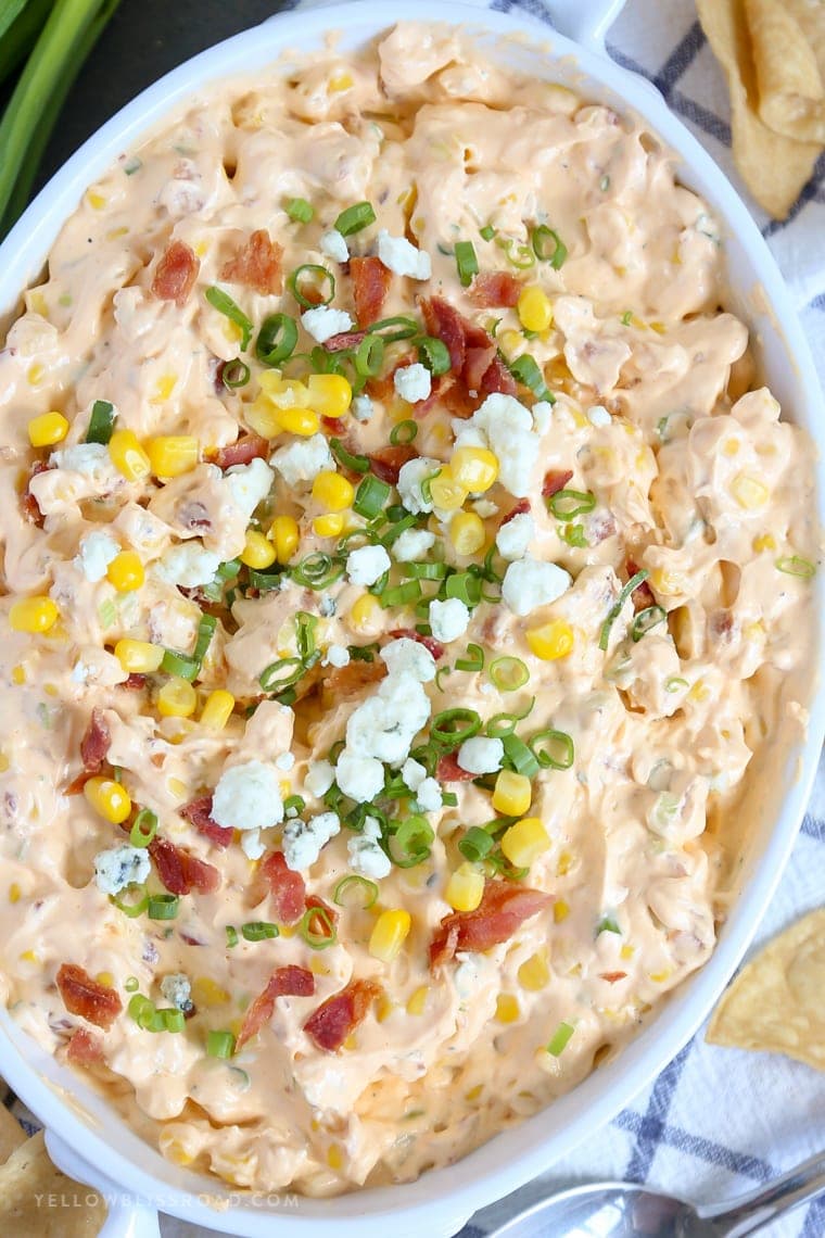 My Buffalo Bacon Ranch Corn Dip is a real crowd pleaser, with spicy buffalo wing sauce, sweet corn, tangy blue cheese and creamy ranch!