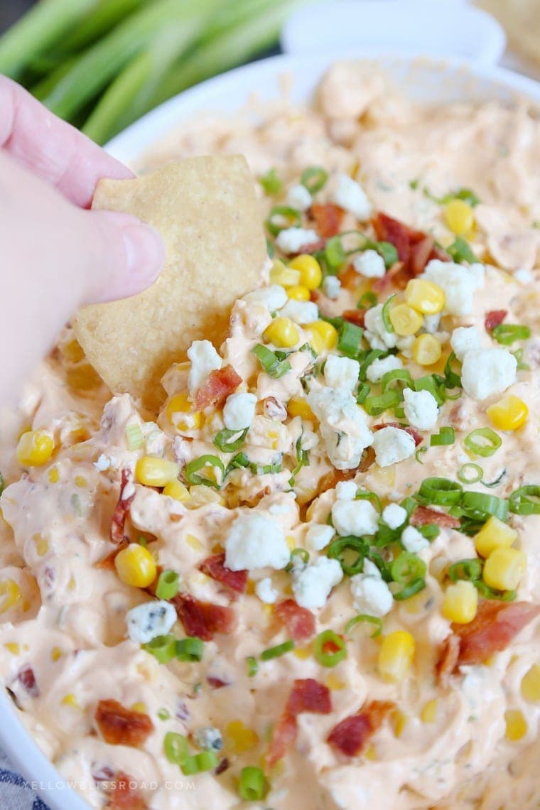 My Buffalo Bacon Ranch Corn Dip is a real crowd pleaser, with spicy buffalo wing sauce, sweet corn, tangy blue cheese and creamy ranch!