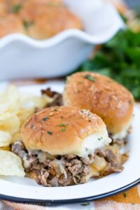 A close up of roast beef sliders