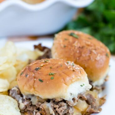 A close up of roast beef sliders