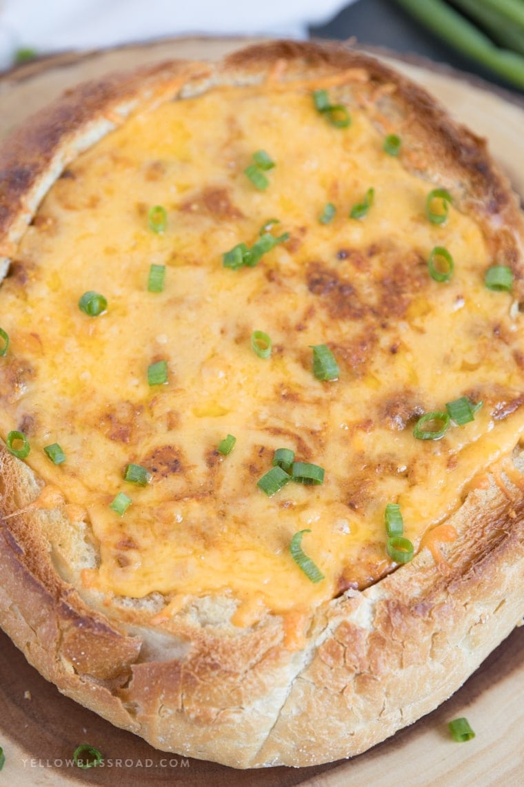 Easy Chili Cheese Dip in a Bread Bowl Game Day Eats