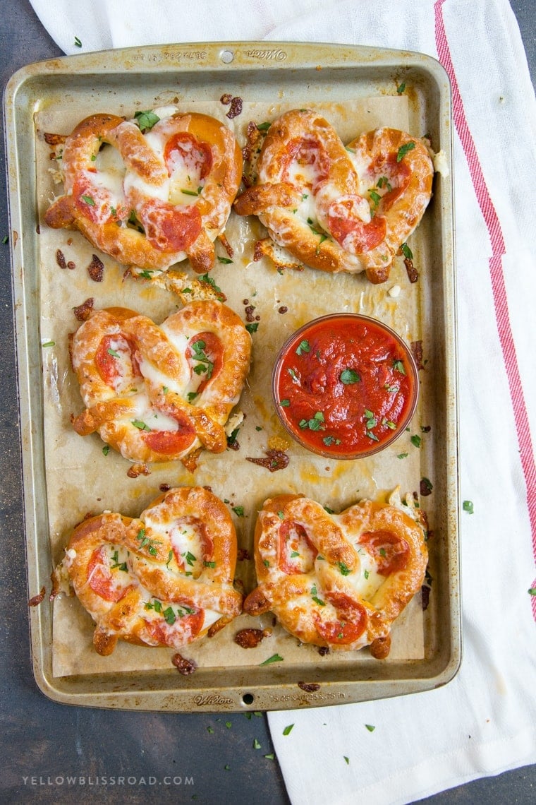 These Easy Garlic Butter Pizza Pretzels are a perfect after school snack and are also great hand-held food for game day parties!