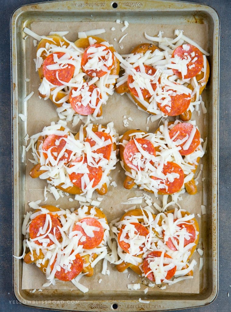 These Easy Garlic Butter Pizza Pretzels are a perfect after school snack and are also great hand-held food for game day parties!