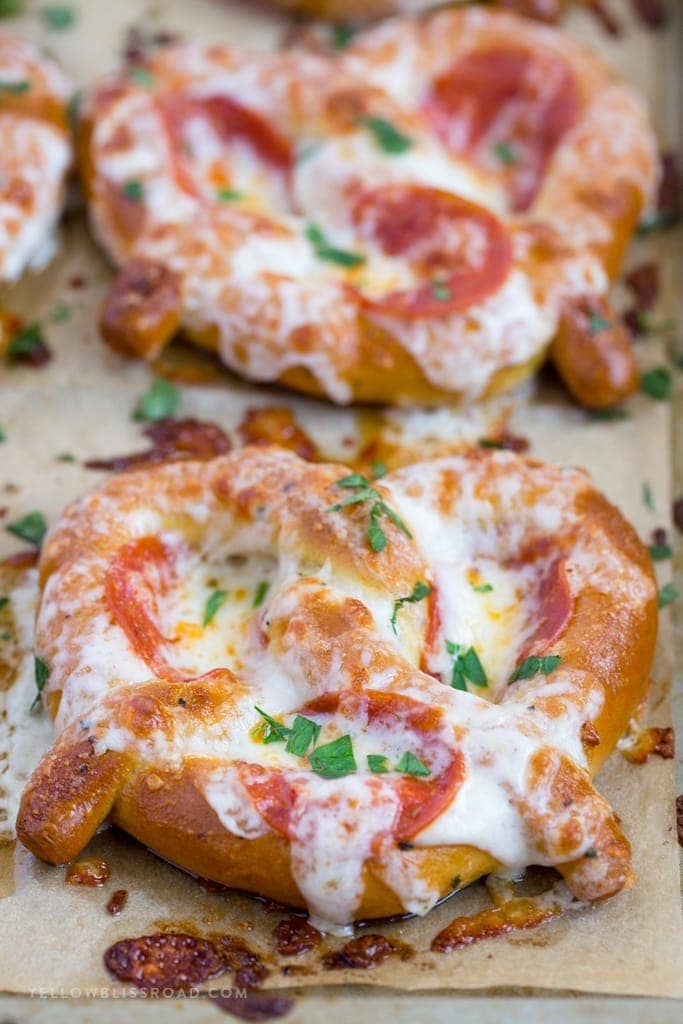 These Easy Garlic Butter Pizza Pretzels are a perfect after school snack and are also great hand-held food for game day parties!