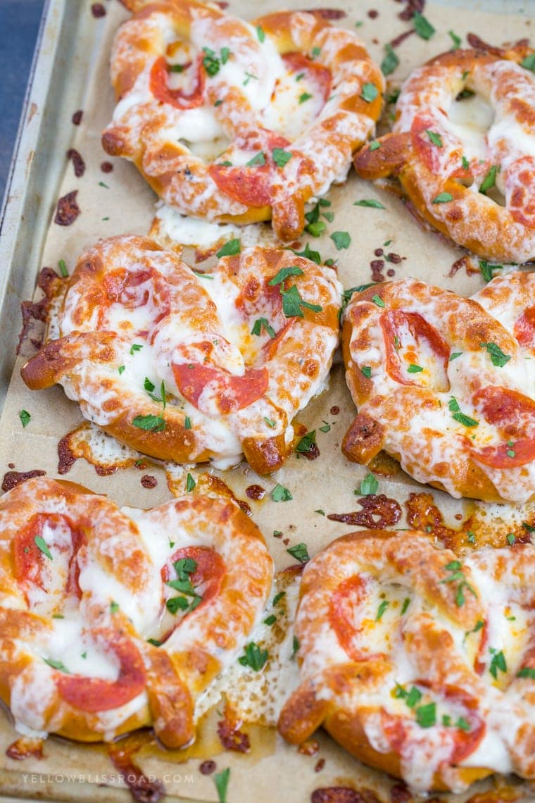 These Easy Garlic Butter Pizza Pretzels are a perfect after school snack and are also great hand-held food for game day parties!