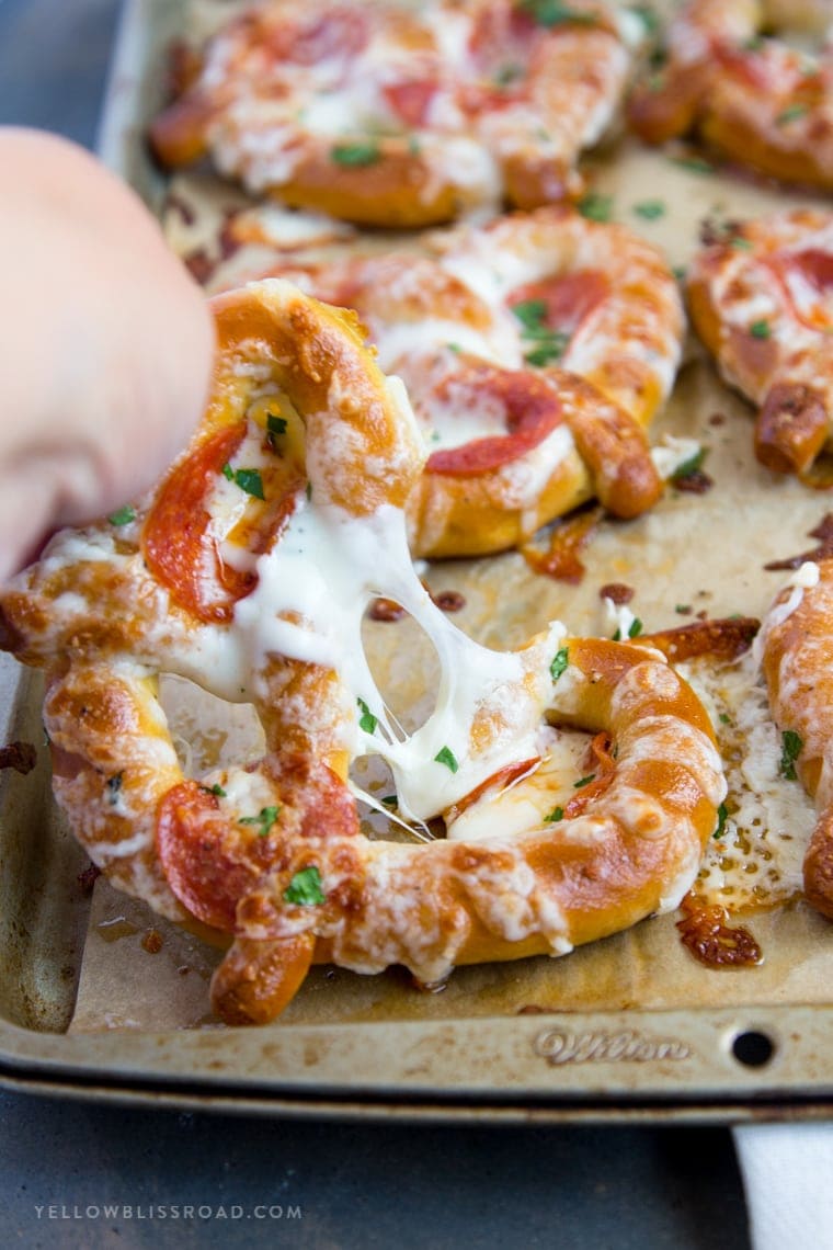 These Easy Garlic Butter Pizza Pretzels are a perfect after school snack and are also great hand-held food for game day parties!