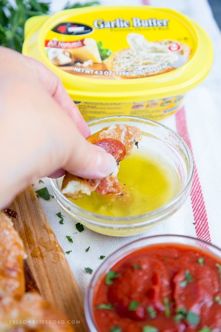 These Easy Garlic Butter Pizza Pretzels are a perfect after school snack and are also great hand-held food for game day parties!