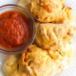 These Mini Sausage and Pepperoni Calzones are the best finger food! They're great for parties, or pack them in your lunch!