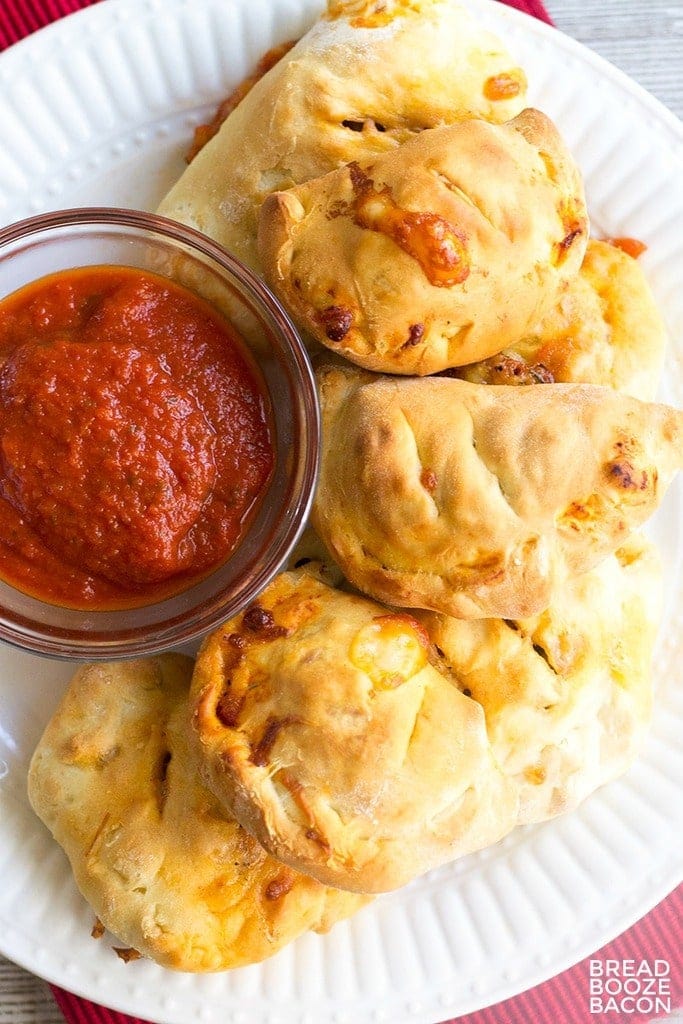 These Mini Sausage and Pepperoni Calzones are the best finger food! They're great for parties, or pack them in your lunch!