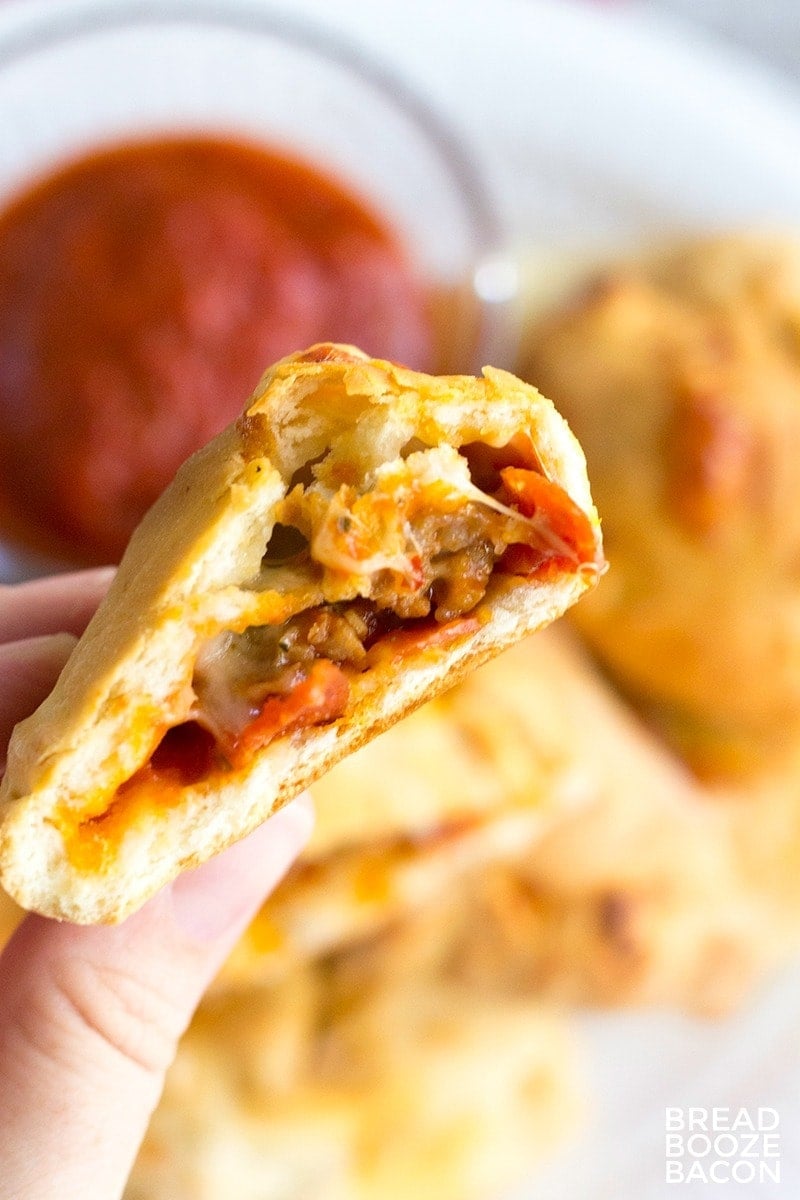These Mini Sausage and Pepperoni Calzones are the best finger food! They're great for parties, or pack them in your lunch!
