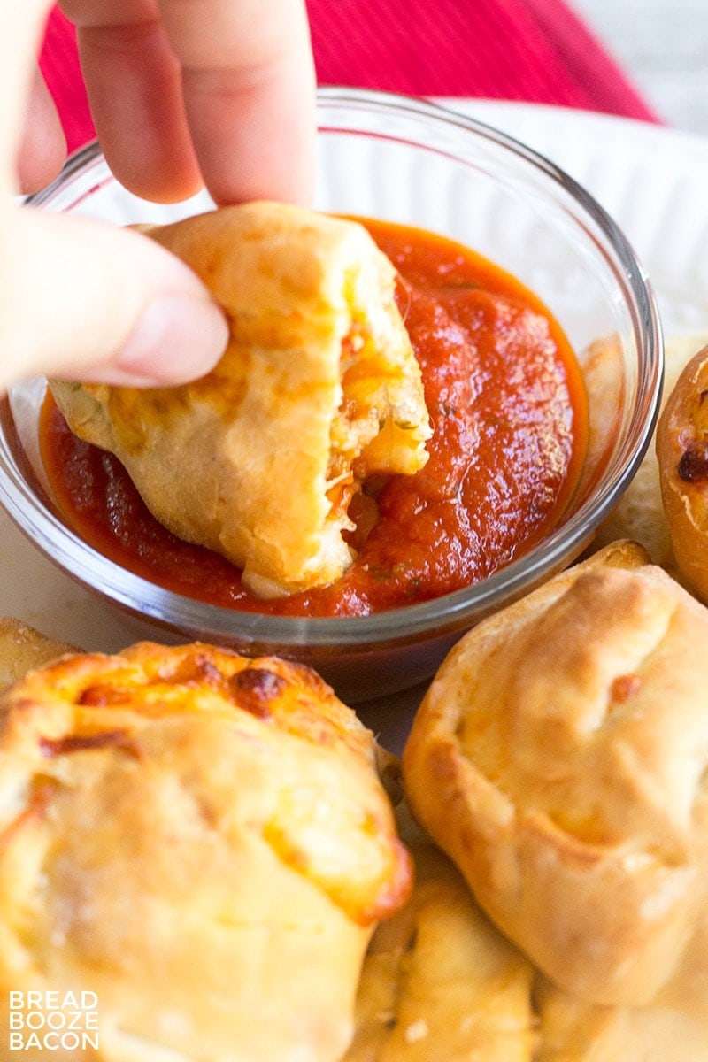 These Mini Sausage and Pepperoni Calzones are the best finger food! They're great for parties, or pack them in your lunch!