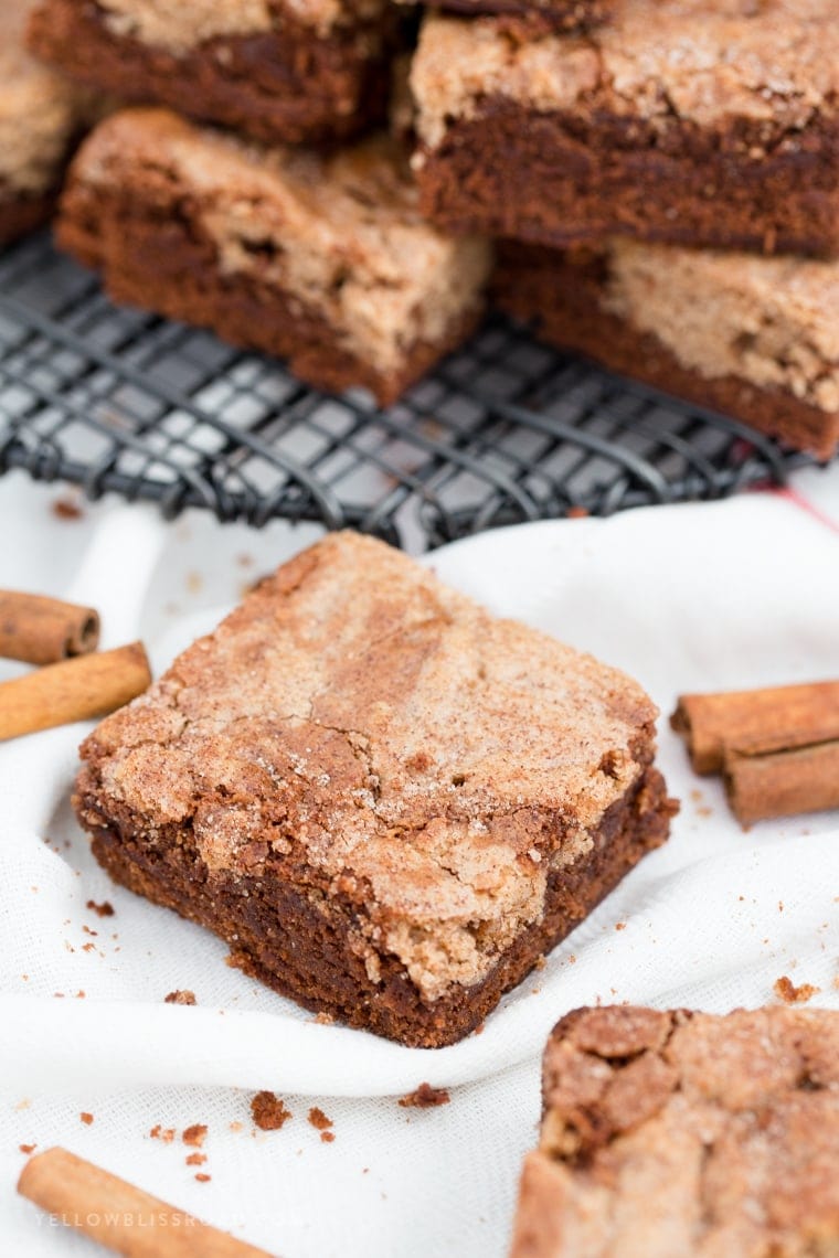 Snickerdoodle Brownies are the best of both worlds - fudgy, chocolatey brownies mixed with warm, cinnamon Snickerdoodles! It's the ultimate classic mash-up dessert!