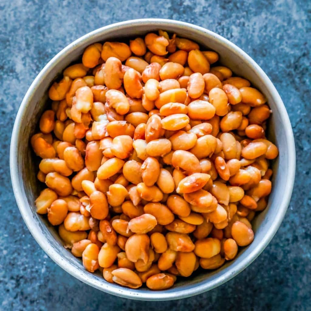 A blue bowl filled with beans