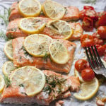 Close up of roasted salmon and tomatoes