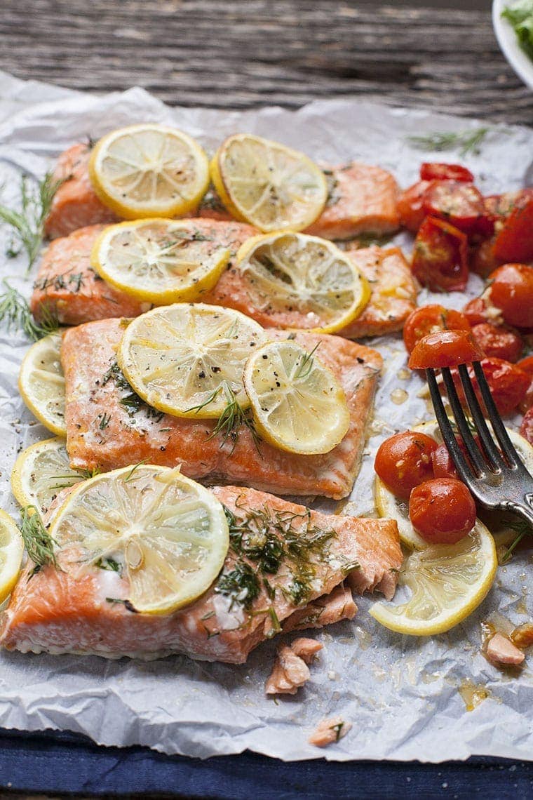 Sheet Pan Lemon Dill Salmon with Roasted Tomatoes is a weeknight dinner dream but still impressive enough for a special occasion. 