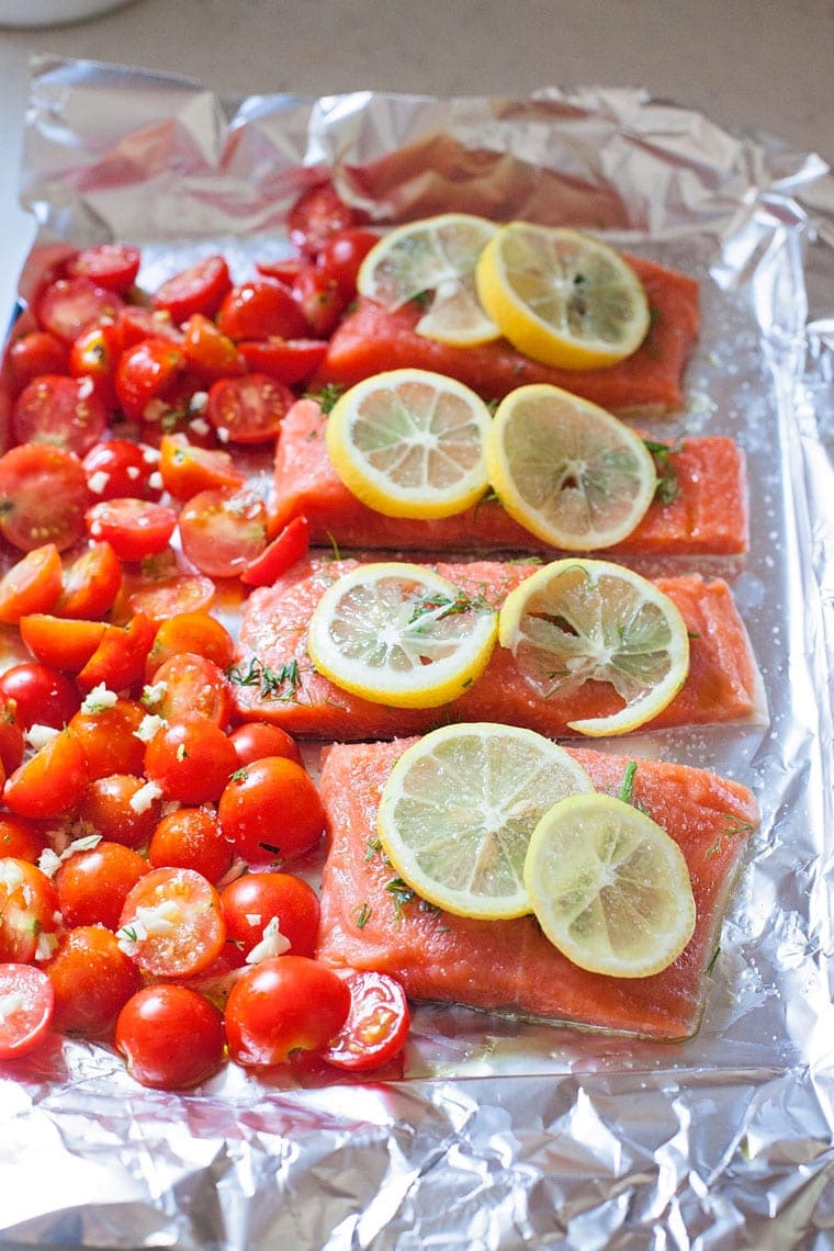 Sheet Pan Lemon Dill Salmon with Roasted Tomatoes is a weeknight dinner dream but still impressive enough for a special occasion. 