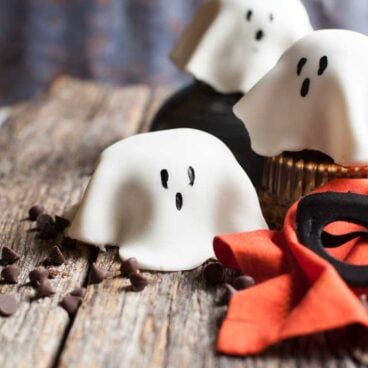 Chocolate mug cake ghost cakes are fun and fast. Make a batch with your little ghosts and goblins!
