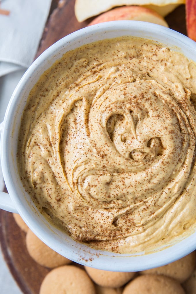 A close up of a bowl of Pumpkin Cheesecake Dip