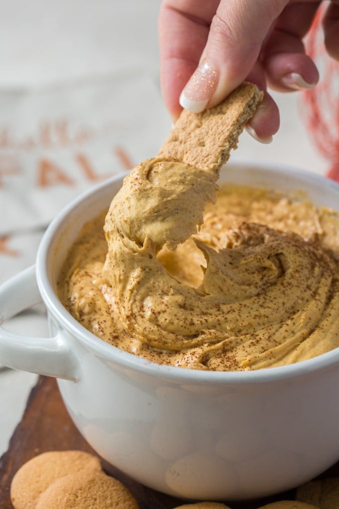 A bowl of Pumpkin Cheesecake Dip