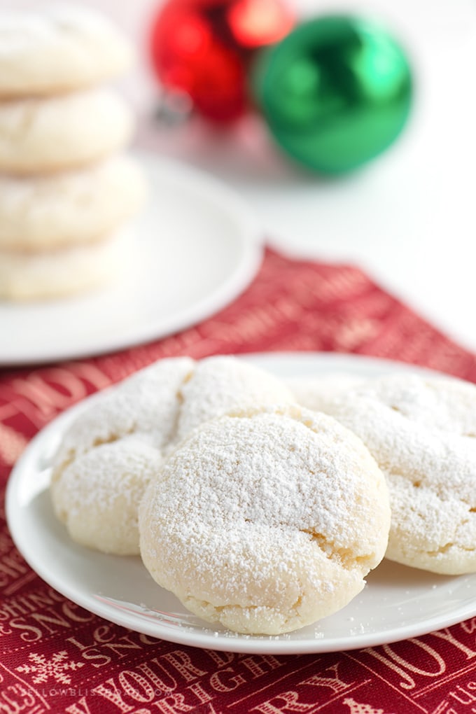A close up of a plate of Snowball cookies