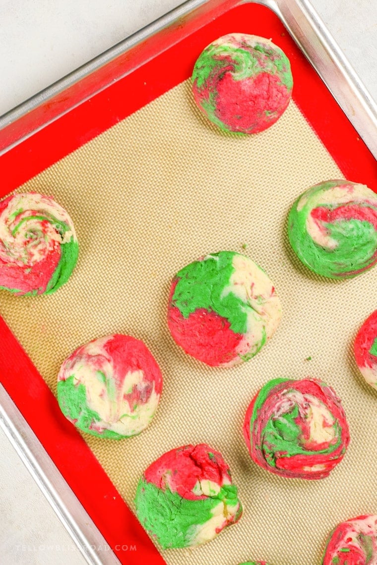 Christmas Cheesecake Cookies are creamy and tender, with just a hint of peppermint. The red, white and green swirls make them Santa's favorite cookie, too!