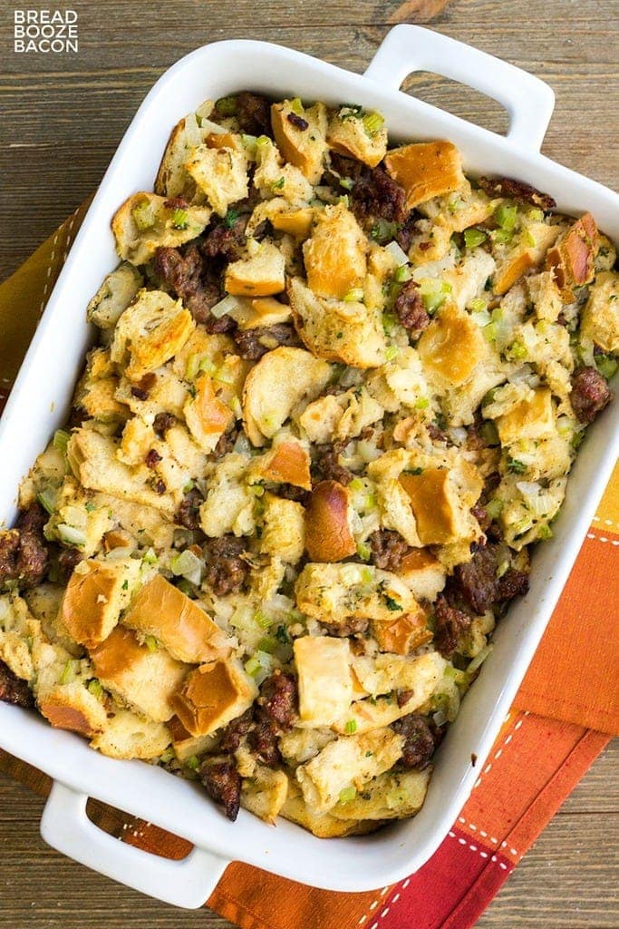 white casserole dish with sausage stuffing