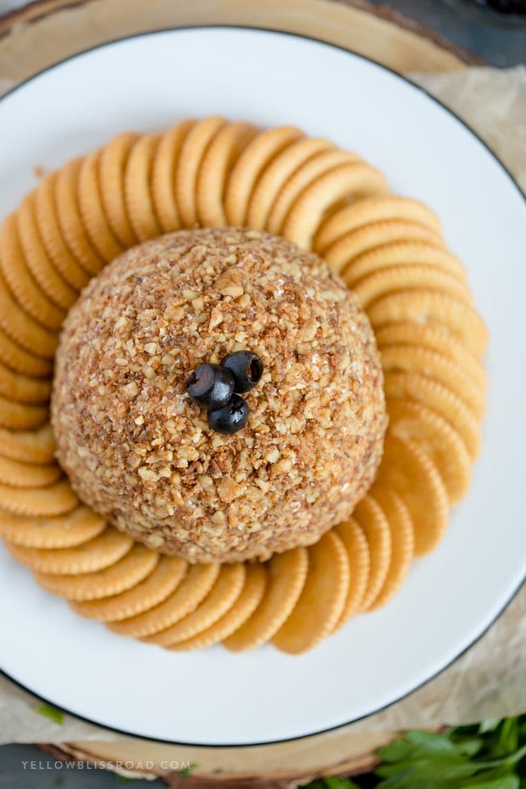 How to make a cheese ball appetizer with olives, walnuts and cheddar cheese