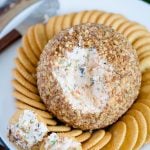 Cheeseball and crackers on a plate