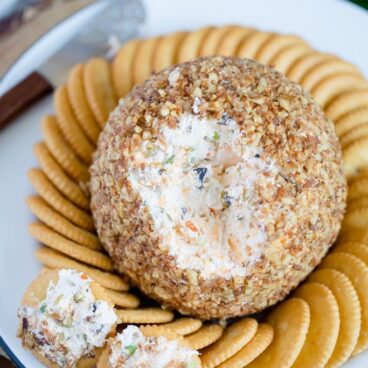 Cheeseball and crackers on a plate