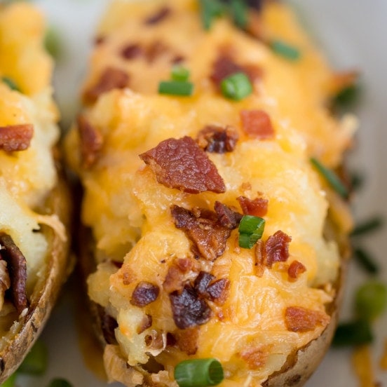 Twice Baked Potatoes - A classic side dish recipe with cheese and bacon