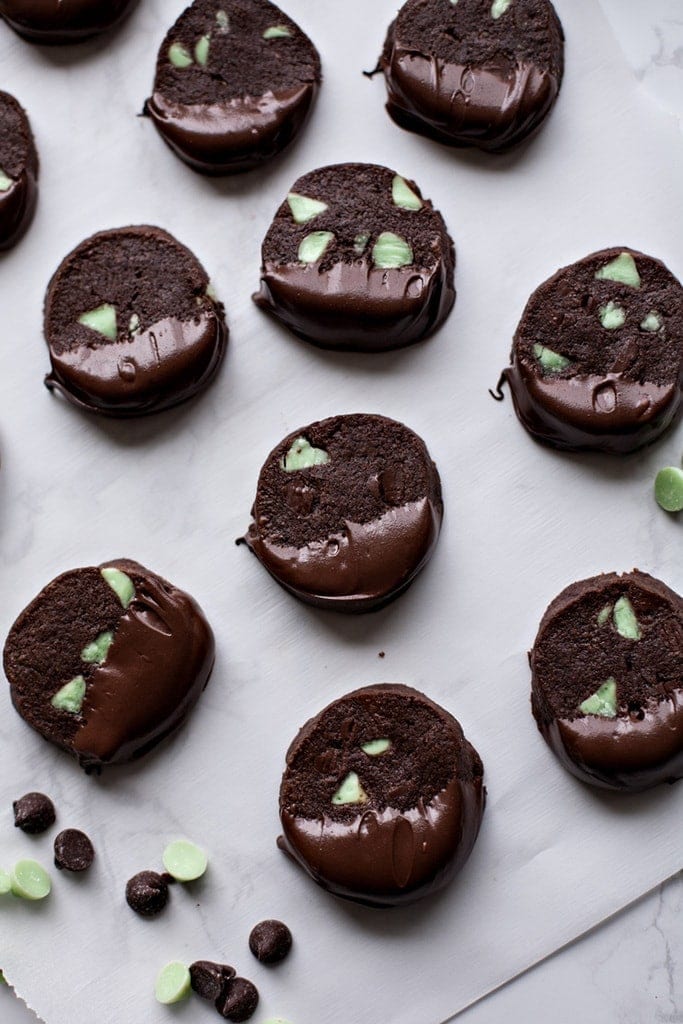 These Chocolate Peppermint Slice and Bake Cookies will become a new holiday favorite! Perfect for cookie exchanges and to have on hand for all kinds of parties and to give as gifts!