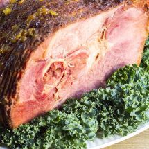 This Easy Baked Glazed Ham will be the star of your holiday table! This recipe will make your house smell amazing and it tastes even better!