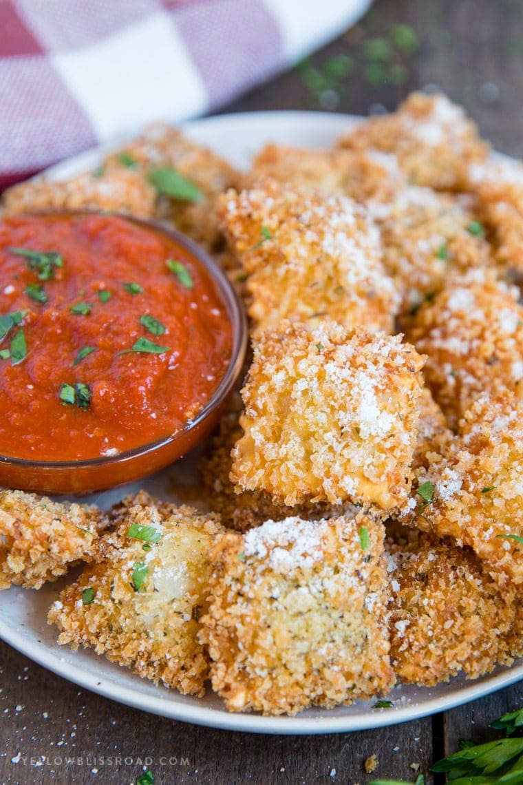 Fried Ravioli on a plate with marinara.