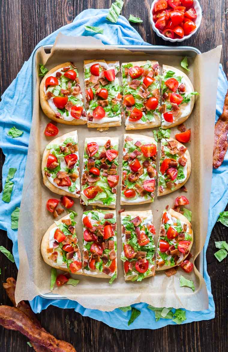 BLT Ranch Flatbread sliced up on a pan from overhead.