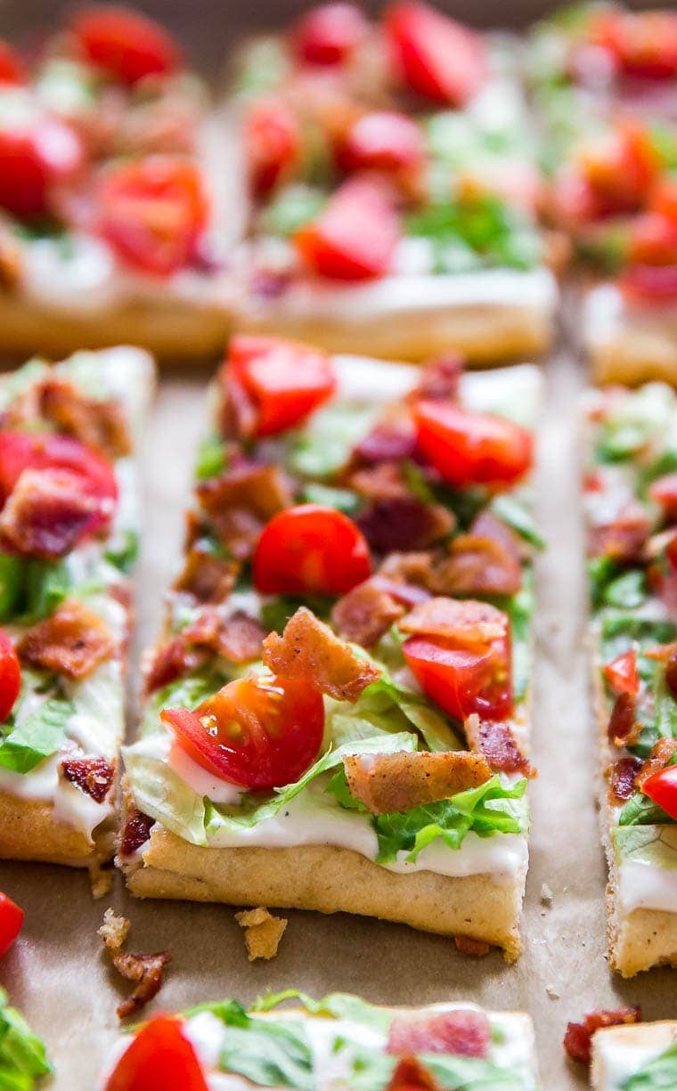 A close up image of a slice of BLT Ranch Flatbread 