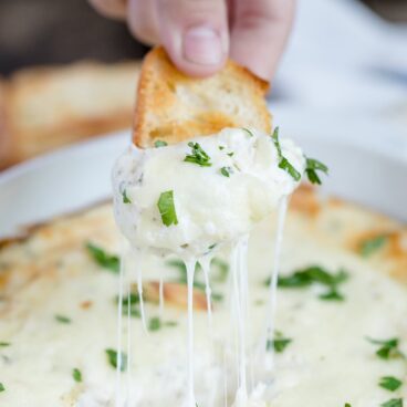 A close up of Cheesy Garlic Dip
